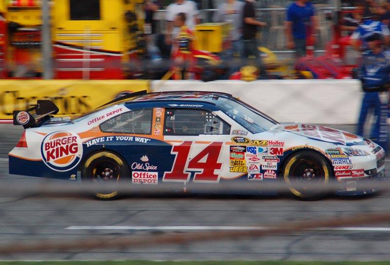 smoke1.jpg - Tony Stewart exiting the pits
