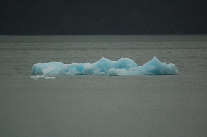 16.JPG - Ice broken off a glacier floats down a river near Whittier, Alaska