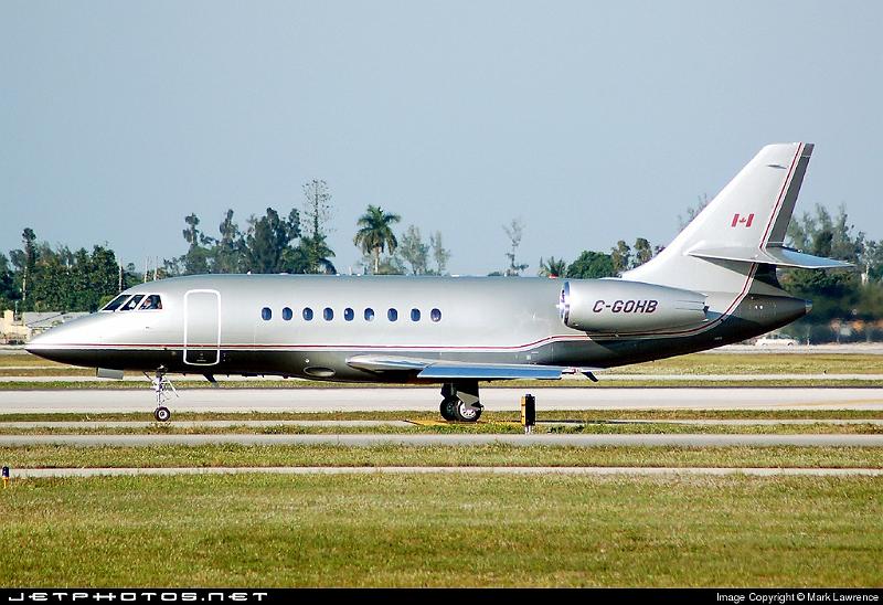 18369_1164321275.jpg - Falcon 2000 taxiing out for departure from Palm Beach International