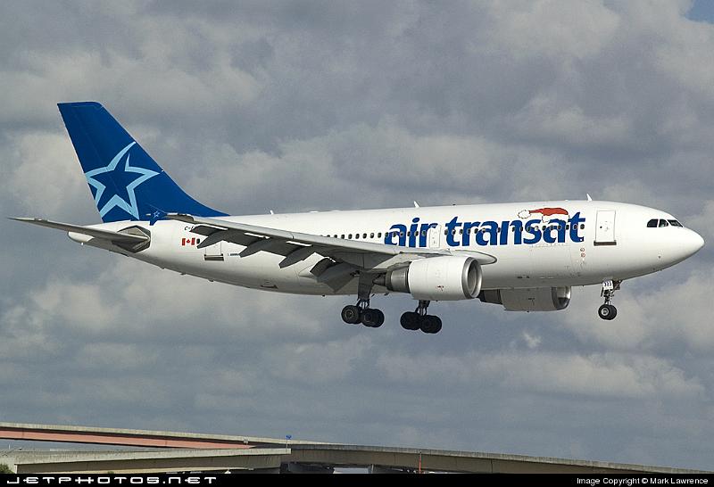 22645_1197305900.jpg - Air Transat A310 arriving at Ft Lauderdale International in Xmas colors