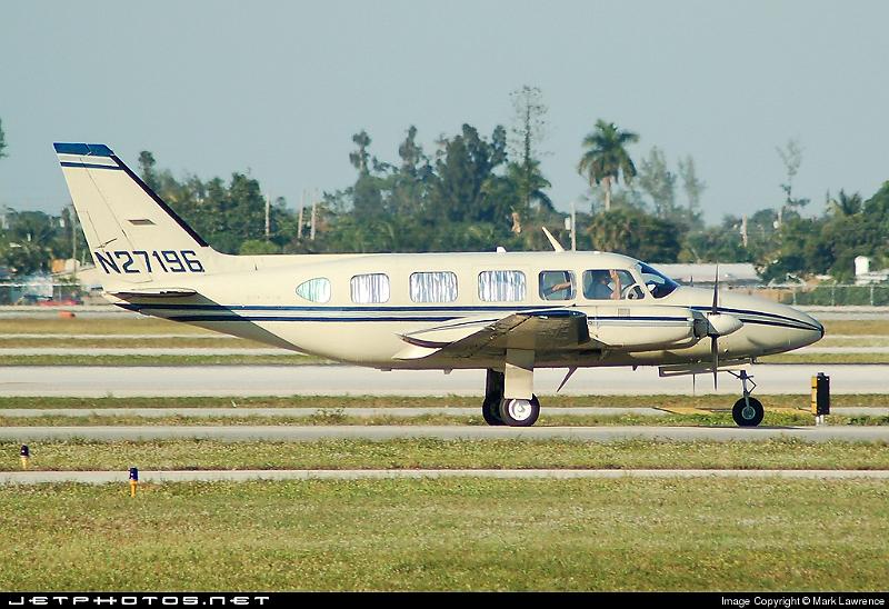 24490_1164888870.jpg - Piper Chieftan powering down runway 9R at Palm Beach International