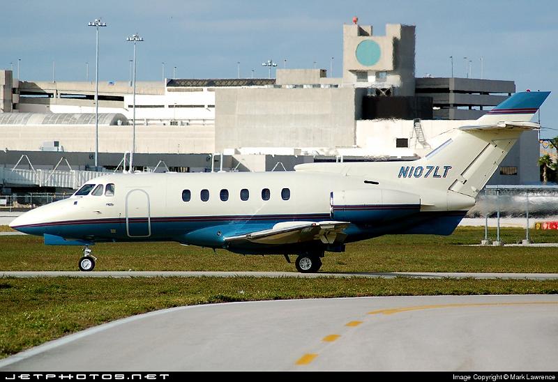 25312_1169084380.jpg - Private HS 125 taxiing out for departure from Palm Beach International