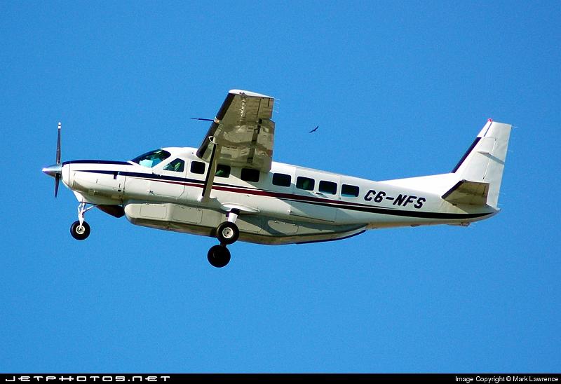 27744_1164283991.jpg - Cessna Caravan departing Palm Beach International