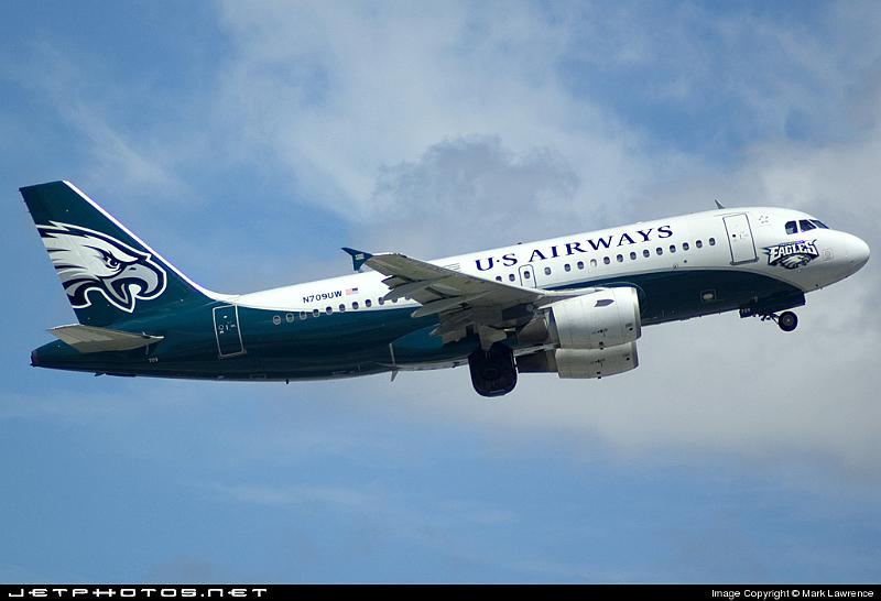 42555_1189702539.jpg - US Airways Philadelphia Eagles scheme A319 departing Ft Lauderdale International