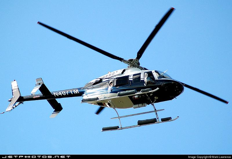 74963_1169084030.jpg - Florida Water Management Bell 407 approaching Palm Beach International