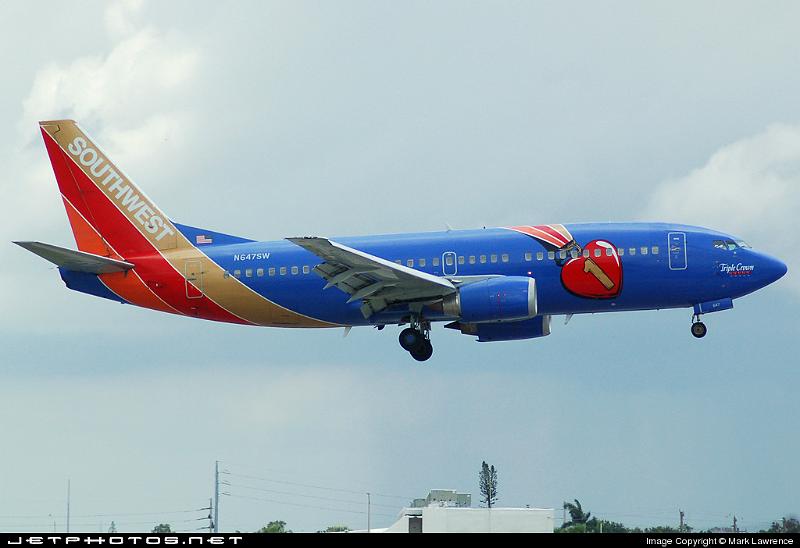 99865_1182189045.jpg - Southwest B737-300 Triple Crown special scheme approaching Ft Lauderdale International