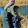 Our friend Gary teaching Tavus to fly fish for trout